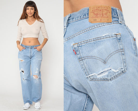 90s Levi's 501 Light Blue Distressed Denim Jeans Straight Leg 34