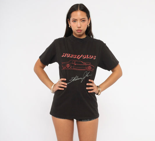 Hurst Olds Car Tee 90s Black Graphic Shirt Muscle Automobile Racing Vintage Mock Neck Cotton Hanes Band Style Streetwear Onyx Unisex Short Sleeve Top Small S
