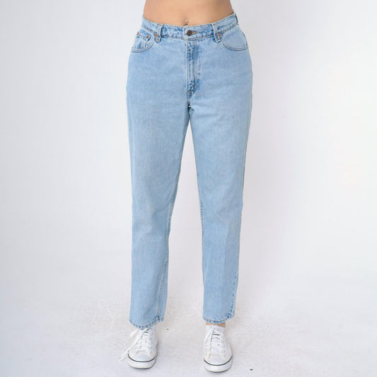 90s Levi's 550 High Waist Relaxed Tapered Jeans Light Wash Medium