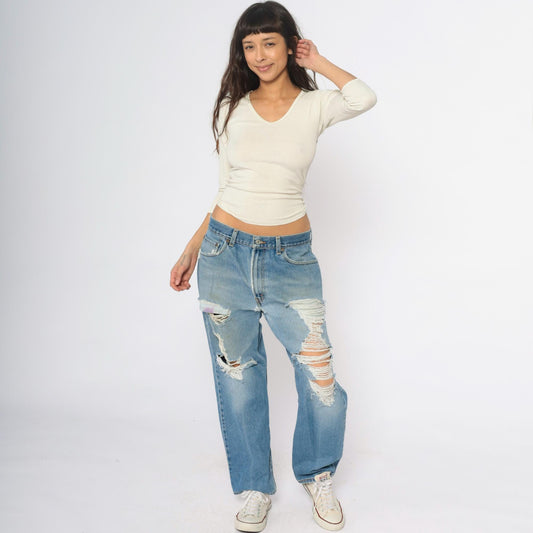 Y2K Levi's 550 Light Wash Distressed Jeans Ripped Thighs Relaxed Fit 34x29