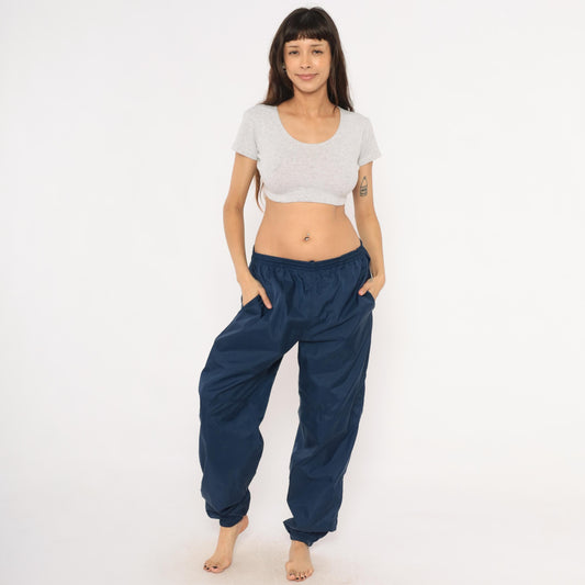 90s Nike Navy Nylon Track Pants Tapered Joggers Drawstring Large L