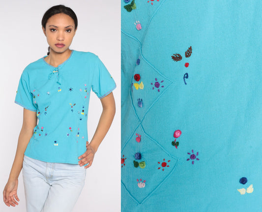 90s Blue Cotton Blouse Embroidered Flowers Butterflies Suns Short Sleeve Medium