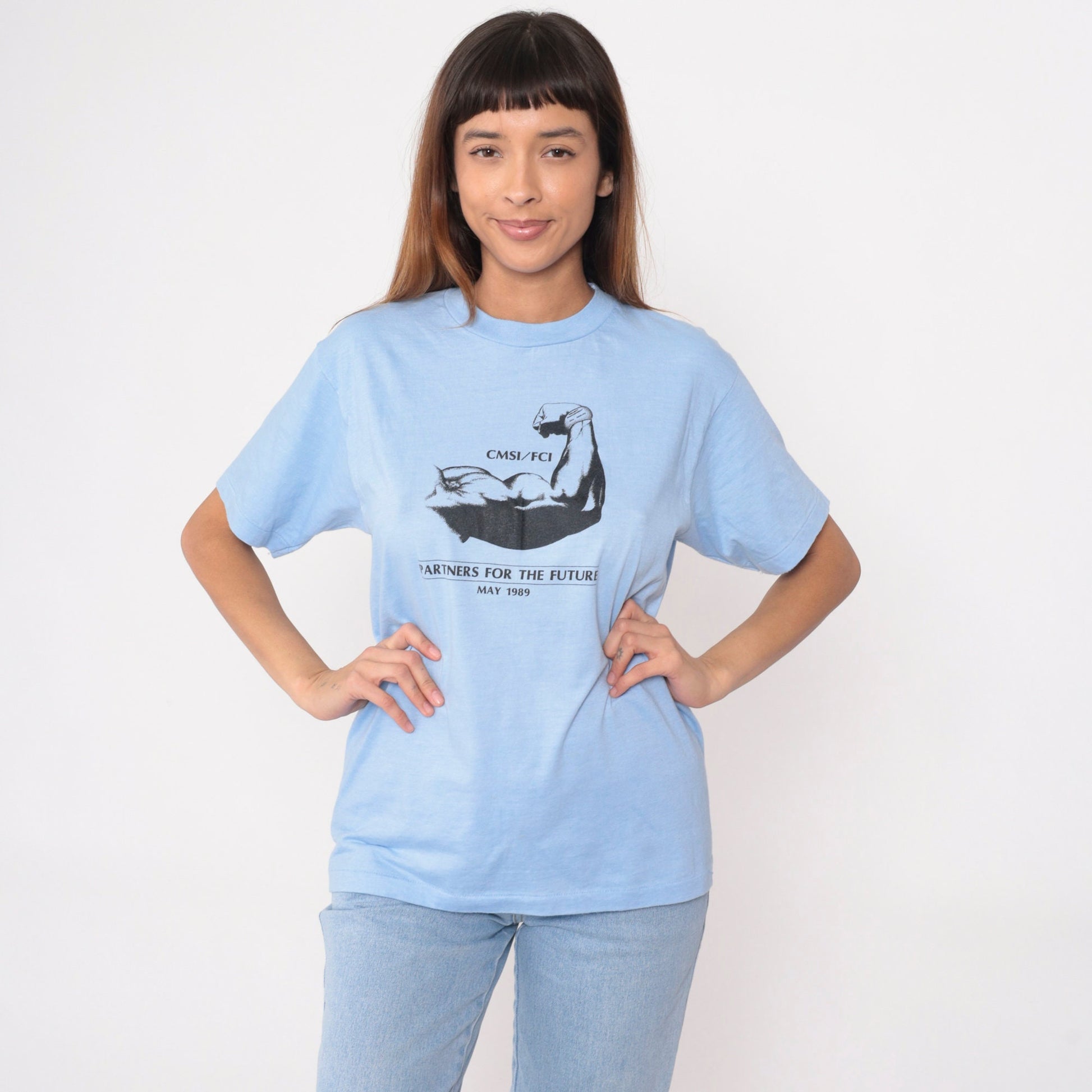 80s Muscular Arm Graphic T-Shirt CMSI FCI Partners Baby Blue Medium