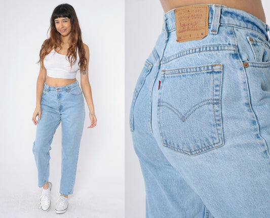 90s Levi's 550 High Waist Relaxed Tapered Jeans Light Wash Medium