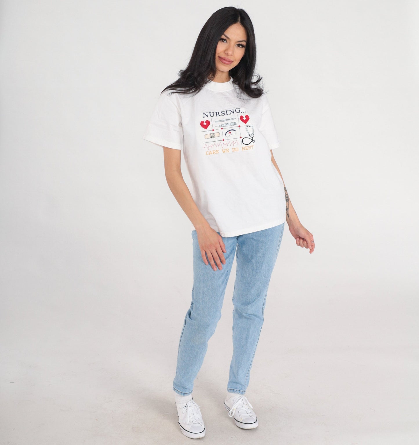 90s Nurse Graphic T-Shirt "Care We Do Best" Embroidered White Cotton Medium M