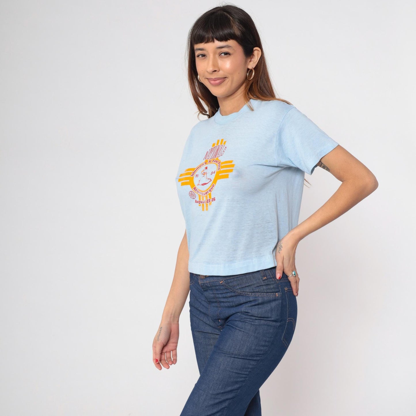 80s Albuquerque Women's A Fast Pitch Softball Graphic Tee Baby Blue Cropped Medium