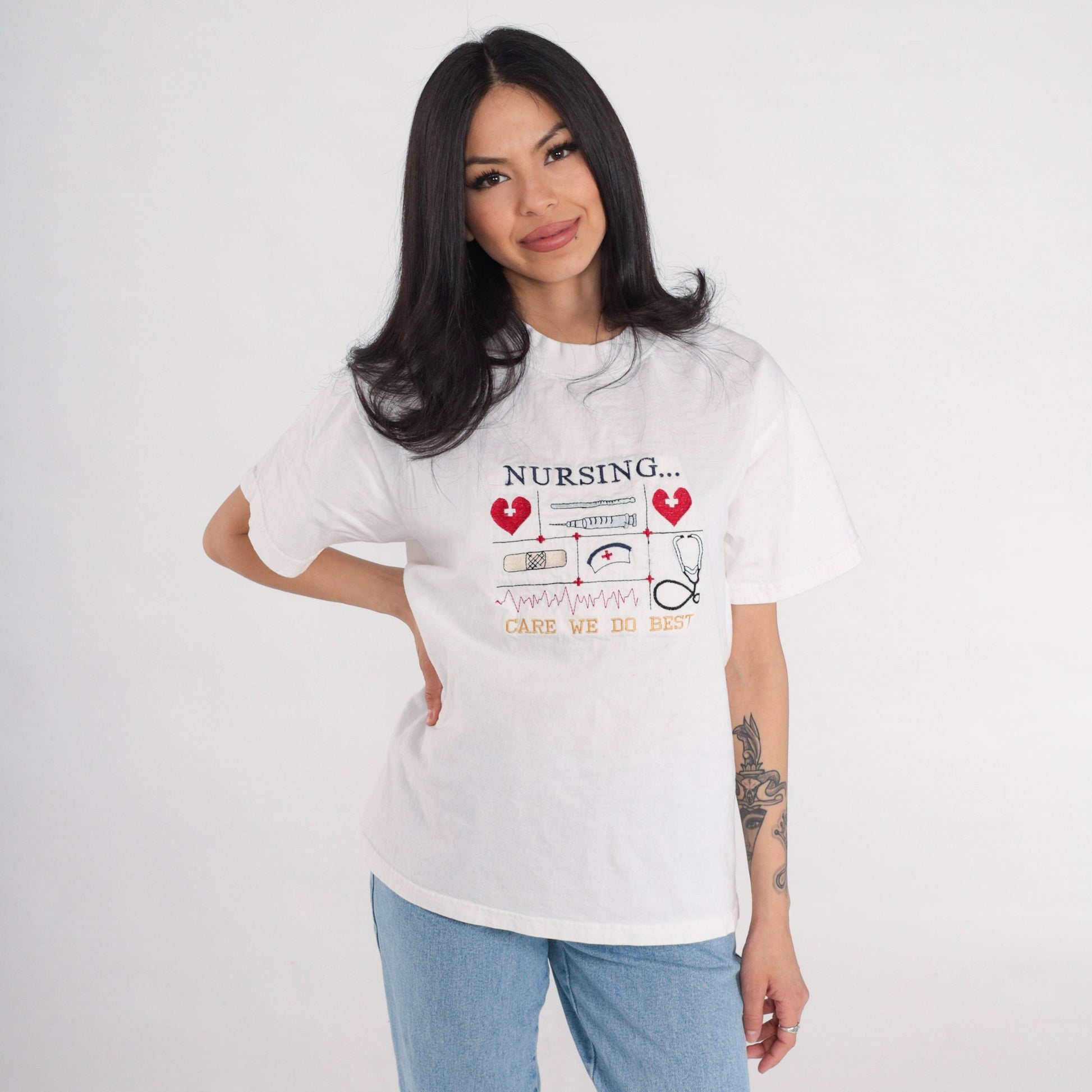 90s Nurse Graphic T-Shirt "Care We Do Best" Embroidered White Cotton Medium M