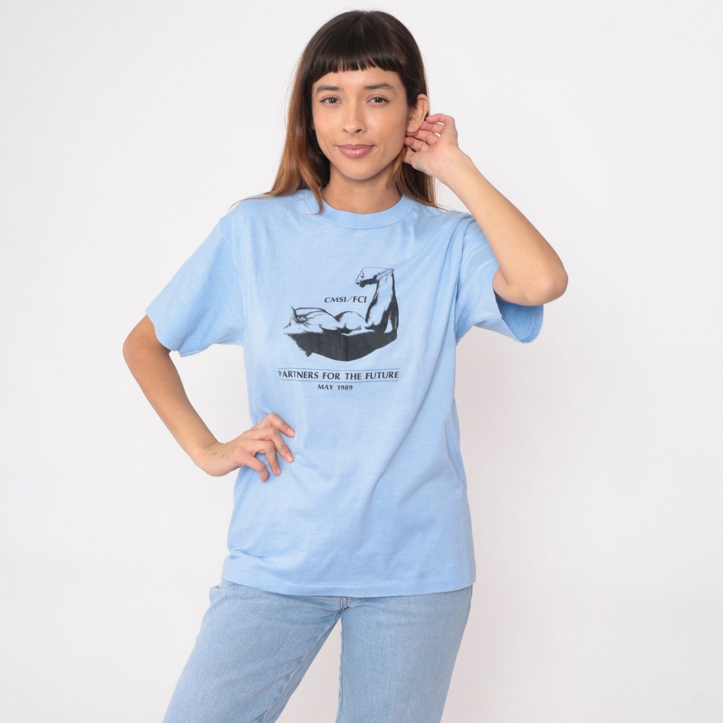 80s Muscular Arm Graphic T-Shirt CMSI FCI Partners Baby Blue Medium