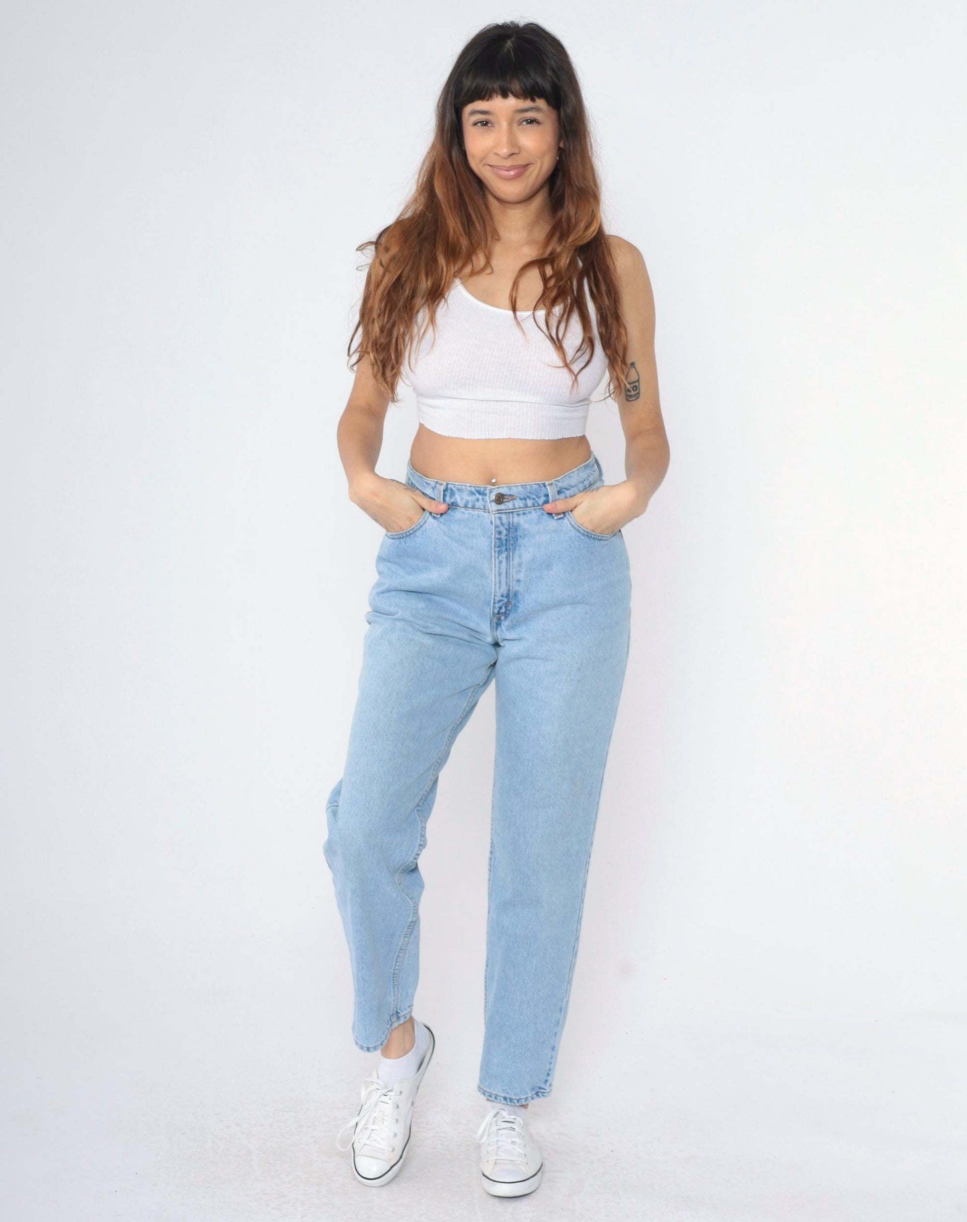 90s Levi's 550 High Waist Relaxed Tapered Jeans Light Wash Medium