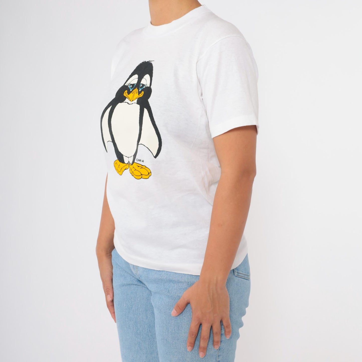 1986 Penguin Graphic T-Shirt "This Penguin Far Exceeds the Average" White Crewneck Small