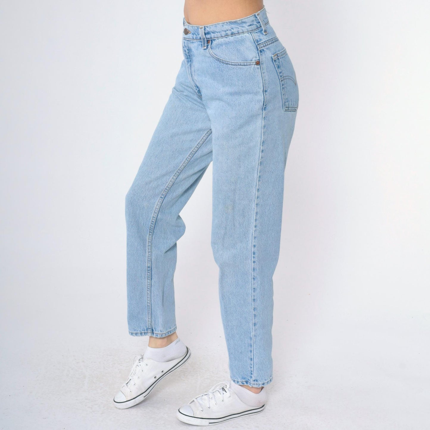 90s Levi's 550 High Waist Relaxed Tapered Jeans Light Wash Medium