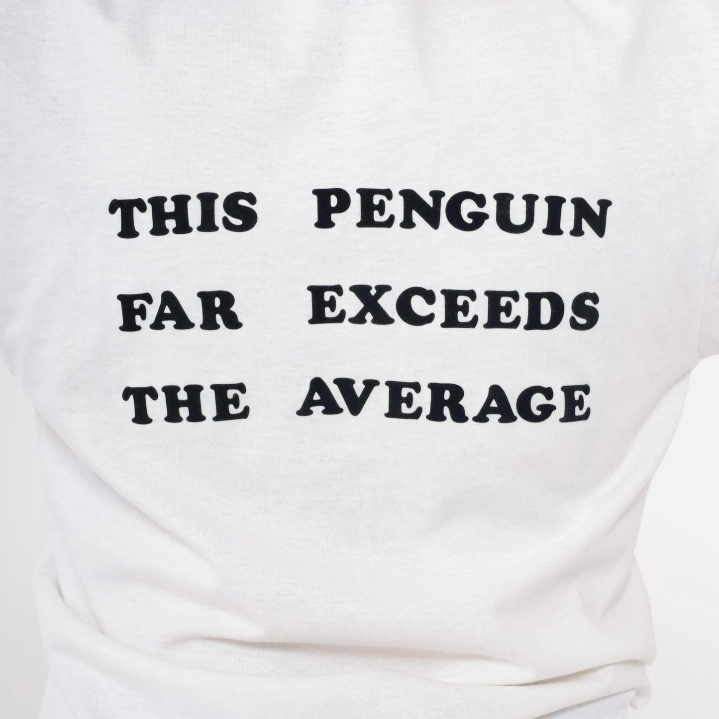 1986 Penguin Graphic T-Shirt "This Penguin Far Exceeds the Average" White Crewneck Small