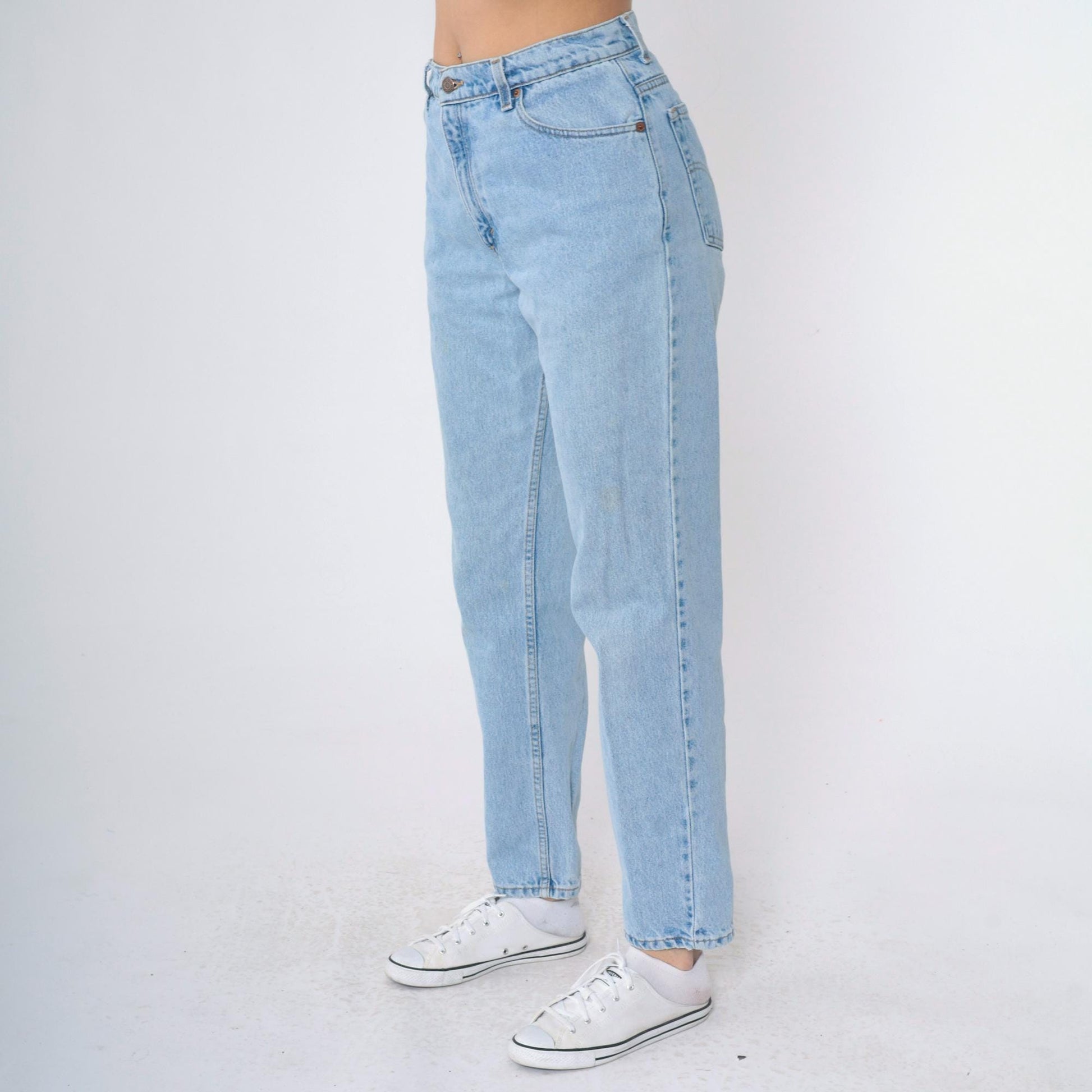 90s Levi's 550 High Waist Relaxed Tapered Jeans Light Wash Medium