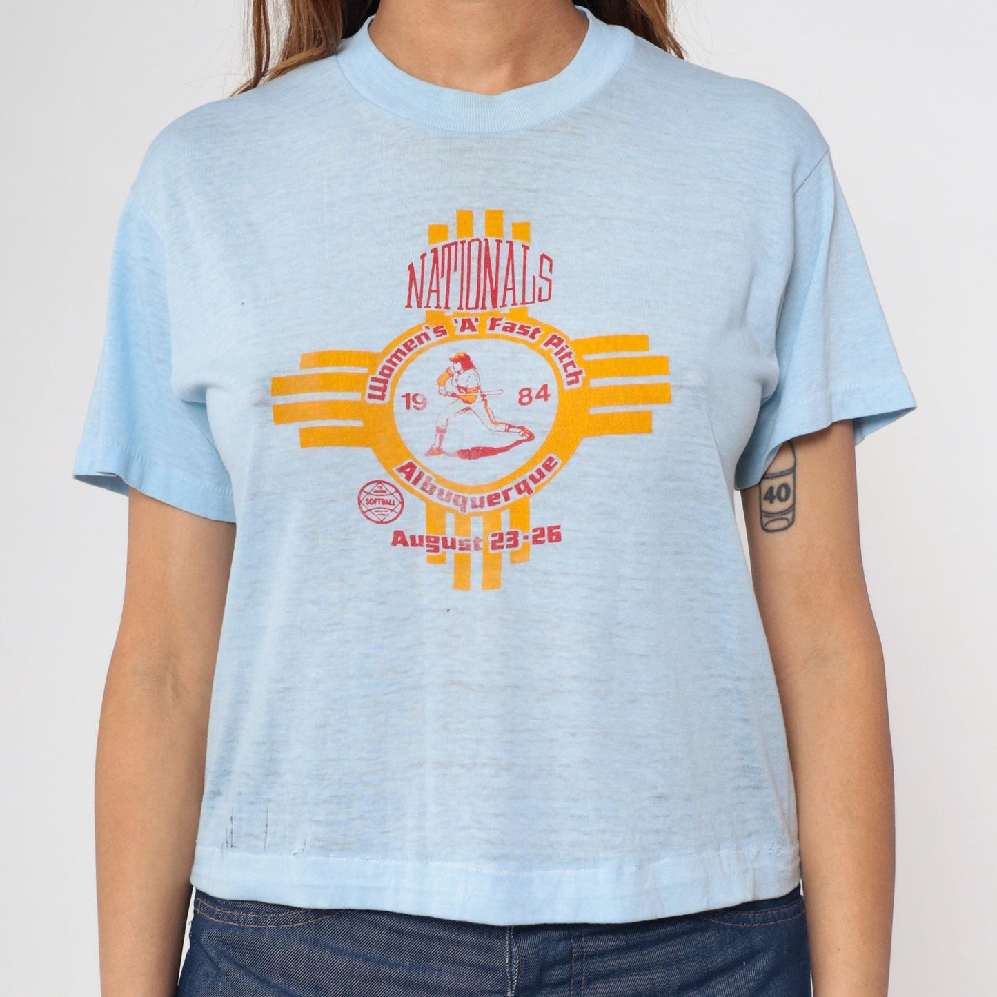 80s Albuquerque Women's A Fast Pitch Softball Graphic Tee Baby Blue Cropped Medium