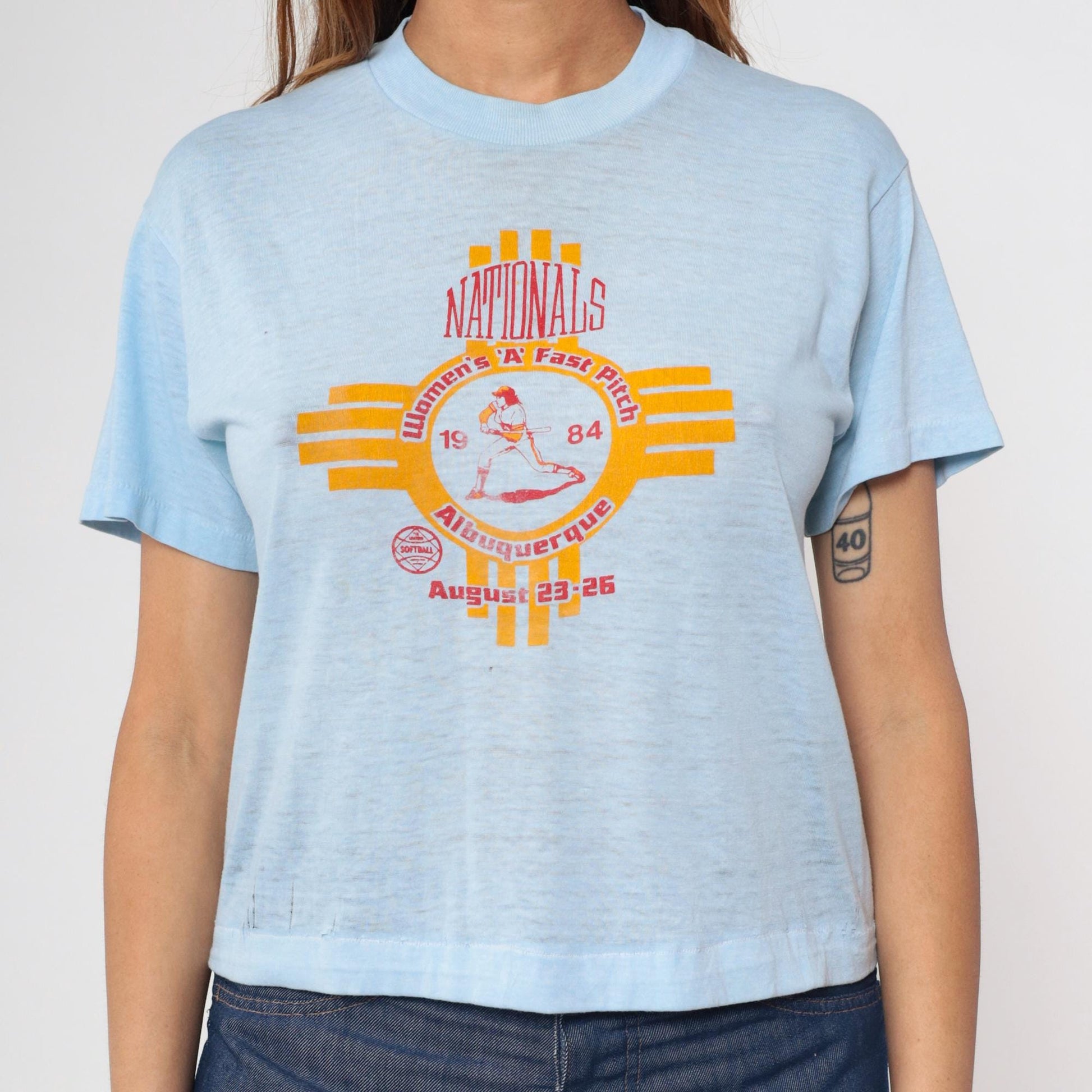 80s Albuquerque Women's A Fast Pitch Softball Graphic Tee Baby Blue Cropped Medium
