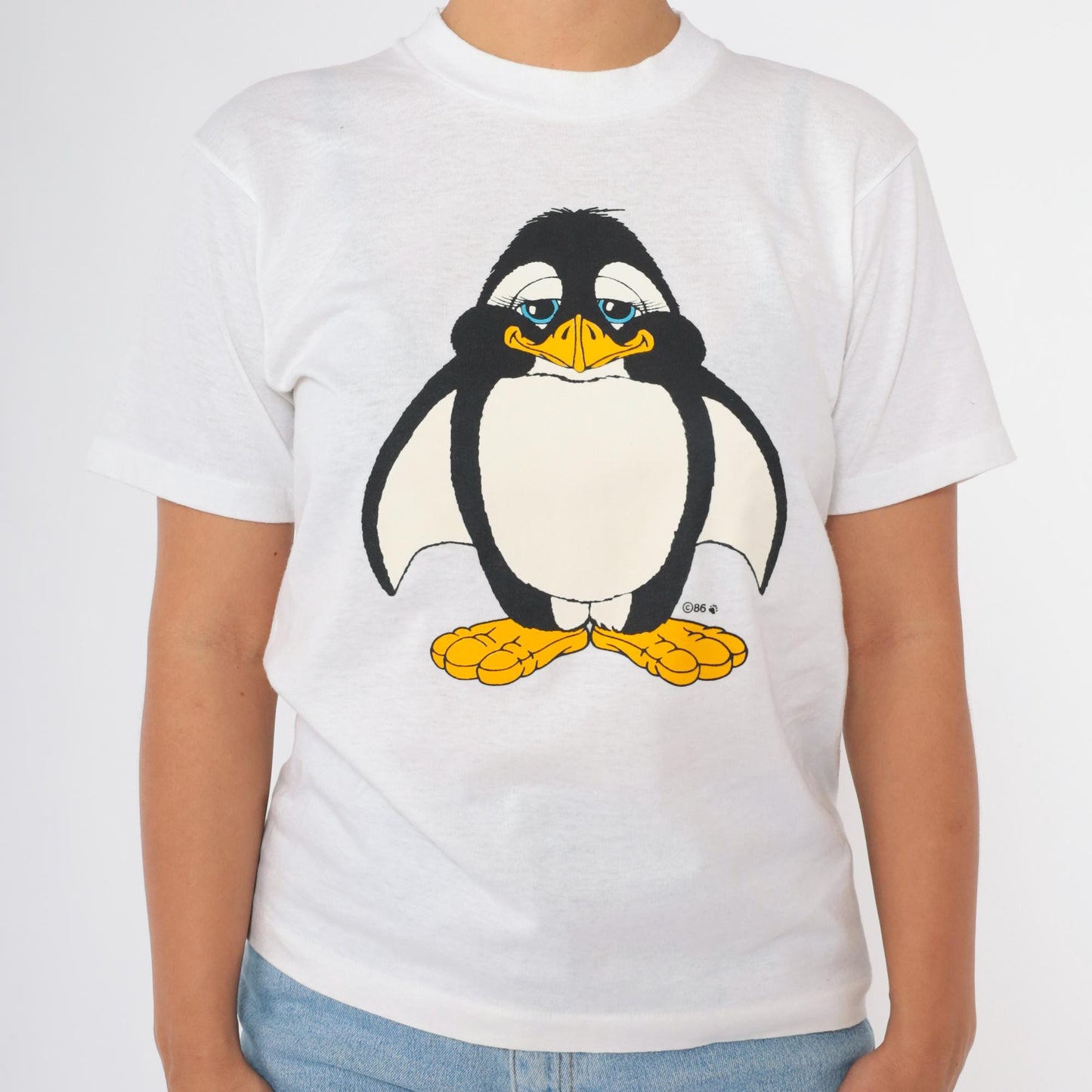 1986 Penguin Graphic T-Shirt "This Penguin Far Exceeds the Average" White Crewneck Small