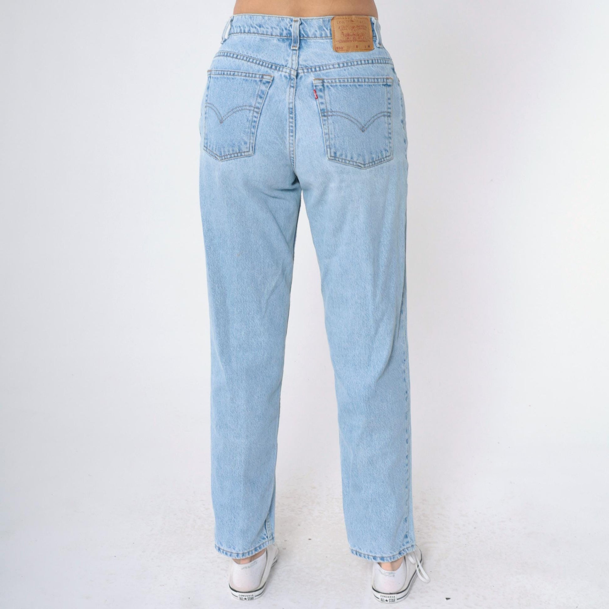 90s Levi's 550 High Waist Relaxed Tapered Jeans Light Wash Medium