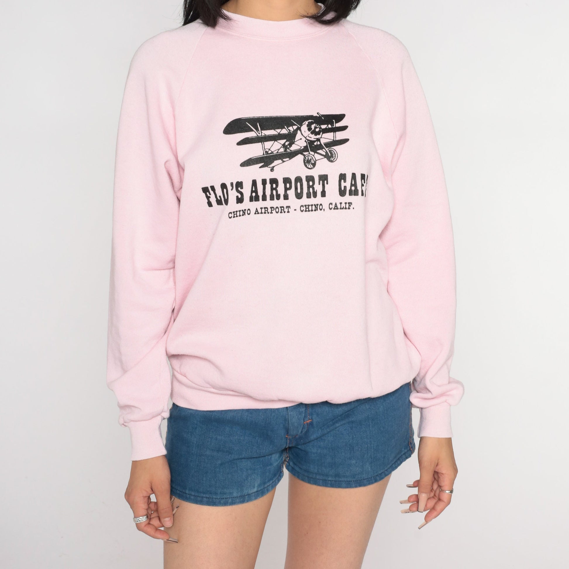 80s Flo's Airport Cafe Graphic Sweatshirt Baby Pink Raglan Large
