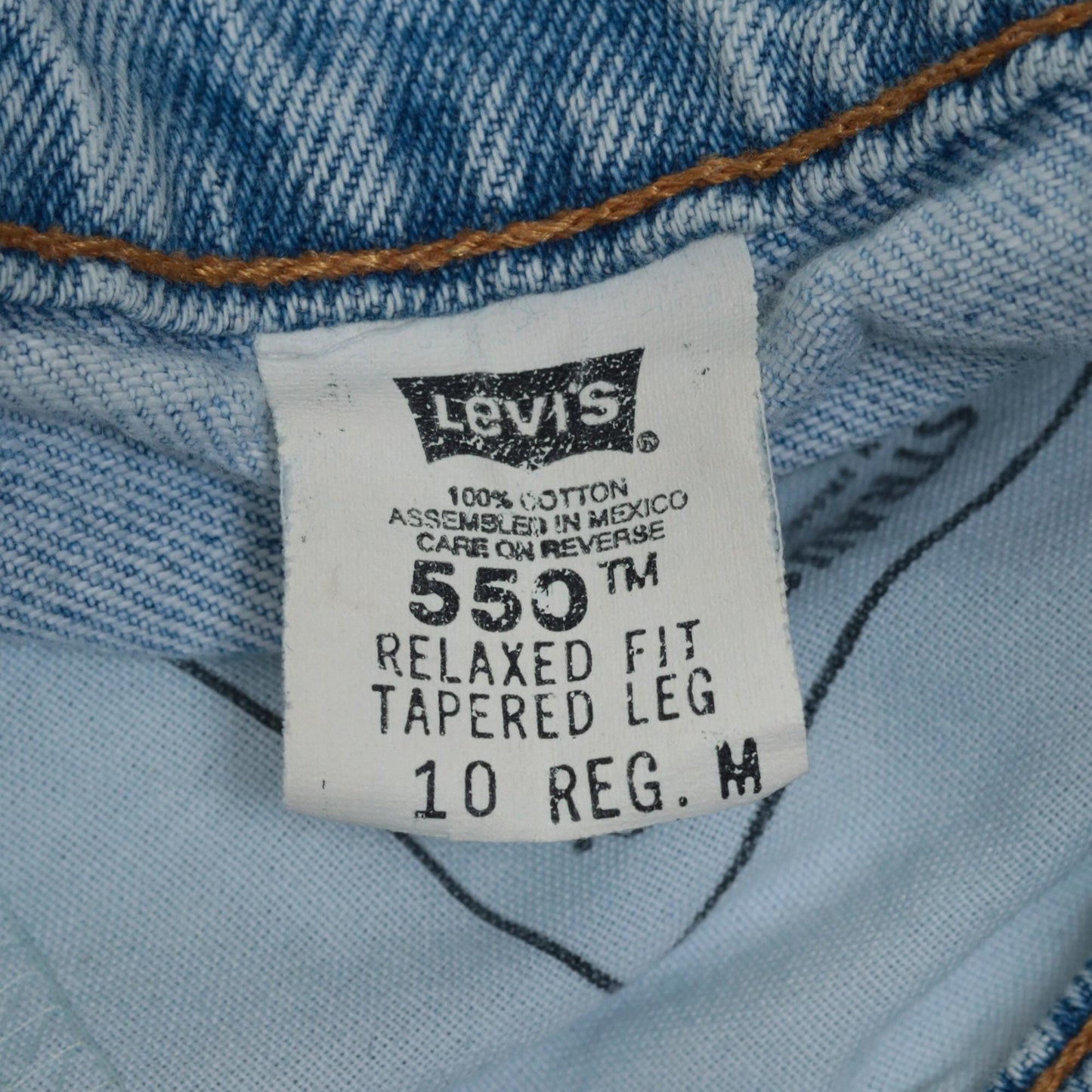 90s Levi's 550 High Waist Relaxed Tapered Jeans Light Wash Medium