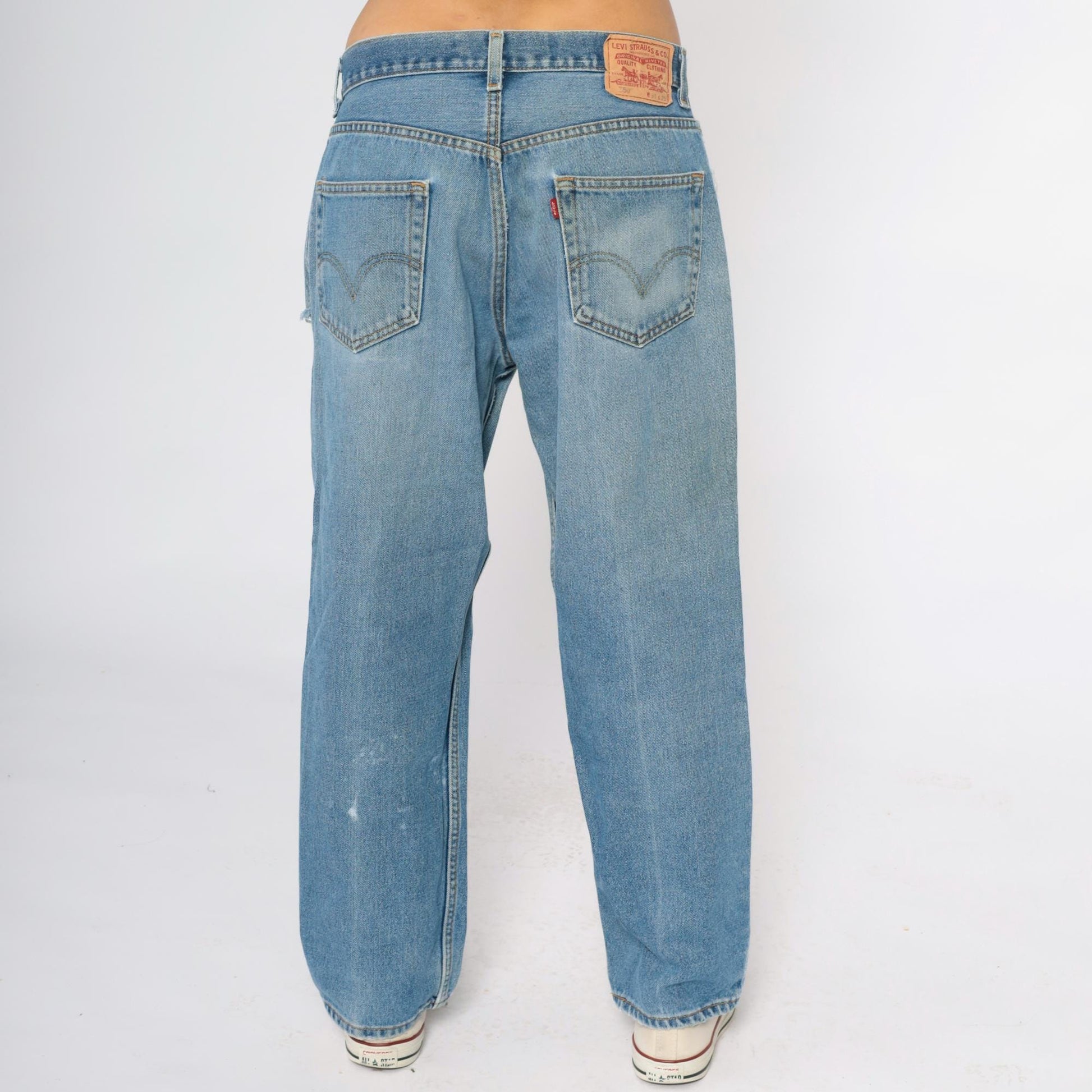 Y2K Levi's 550 Light Wash Distressed Jeans Ripped Thighs Relaxed Fit 34x29