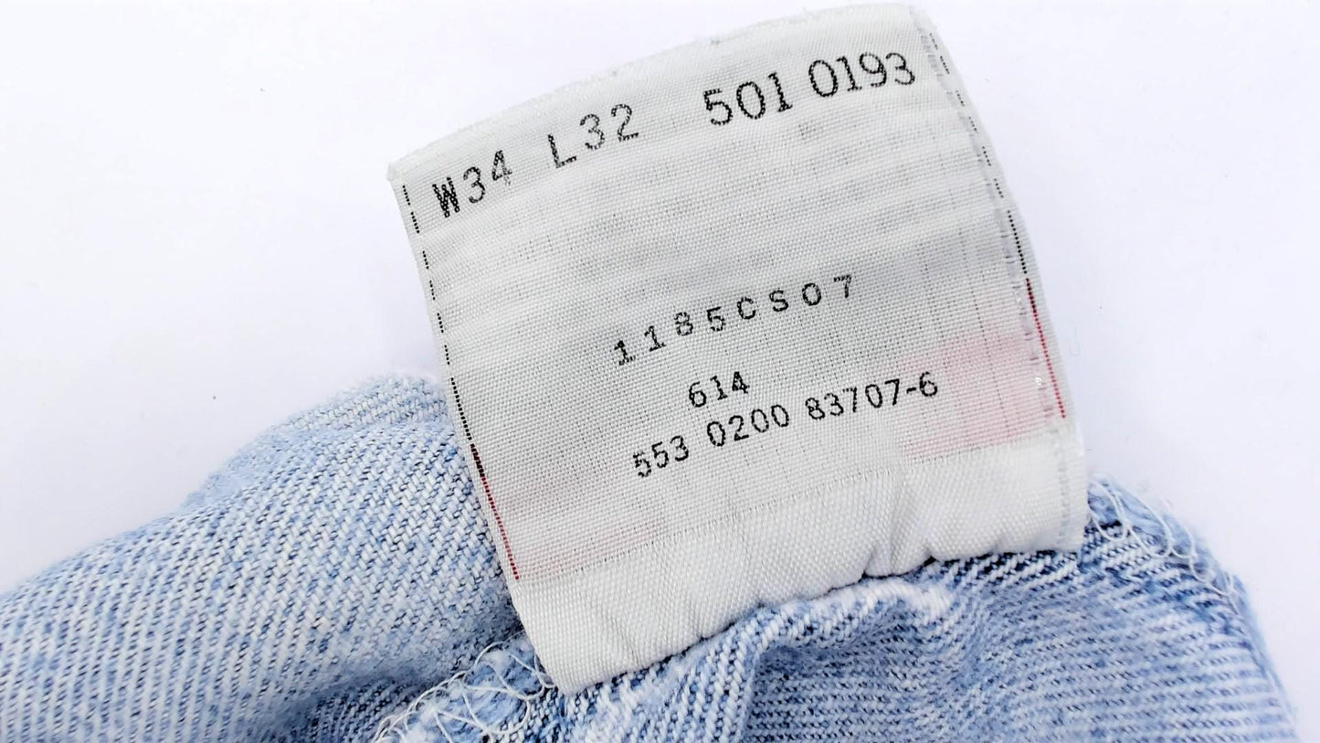 90s Levi's 501 Light Blue Distressed Denim Jeans Straight Leg 34